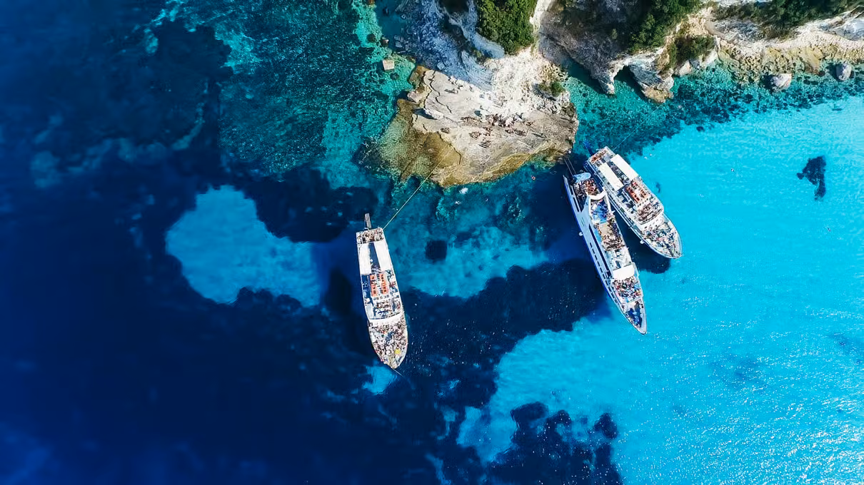 Paxos Blue Caves cruise from Corfu — turquoise water and limestone cliffs